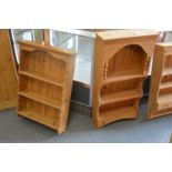 Two pine shelving units.