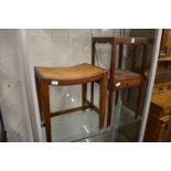 A mahogany washstand and a stool.