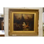 George Armfield, playful dogs in a barn interior, oil on canvas in a decorative gilt frame.