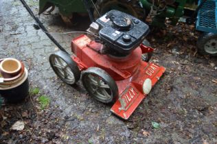A Billy Goat petrol operated garden vacuum (lacking bag).