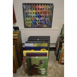 An artist collection of oil paintings on canvas and board, some framed.