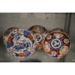 Five Imari plates.