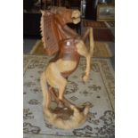 An impressive large carved wood model of a rearing horse 120cm high.