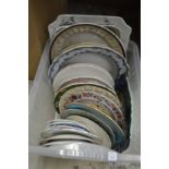 A box of decorative plates.