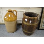 A brass bound wooden bucket together with a large stoneware flagon.