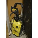 A Karcher pressure washer.