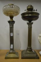 Two corinthian column oil lamp bases.