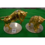 Asprey, a pair of gilt metal bull and bear ornaments.