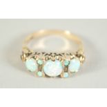 A 9CT. GOLD OPAL VICTORIAN STYLE RING.