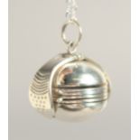 A SILVER FOLDING BALL LOCKET AND CHAIN.