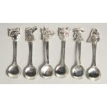 SIX NOVELTY SILVER SPOONS.