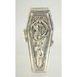 A NOVELTY WHITE METAL COFFIN VESTA, 5.5 cm long.