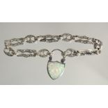 A SILVER OPAL SET BRACELET WITH THISTLE LOCK.