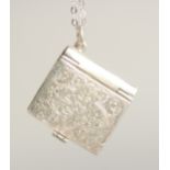 A SILVER BOX LOCKET ON A CHAIN.