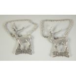 A PAIR OF NOVELTY STAG WINE WHITE METAL SCENT BOTTLES BRANDY AND SHERRY, 6" long.