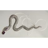 A SILVER MARCASITE AND GARNET SNAKE NECKLACE.