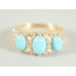A 9CT. GOLD VICTORIAN STYLE TURQUOISE AND PEARL RING.