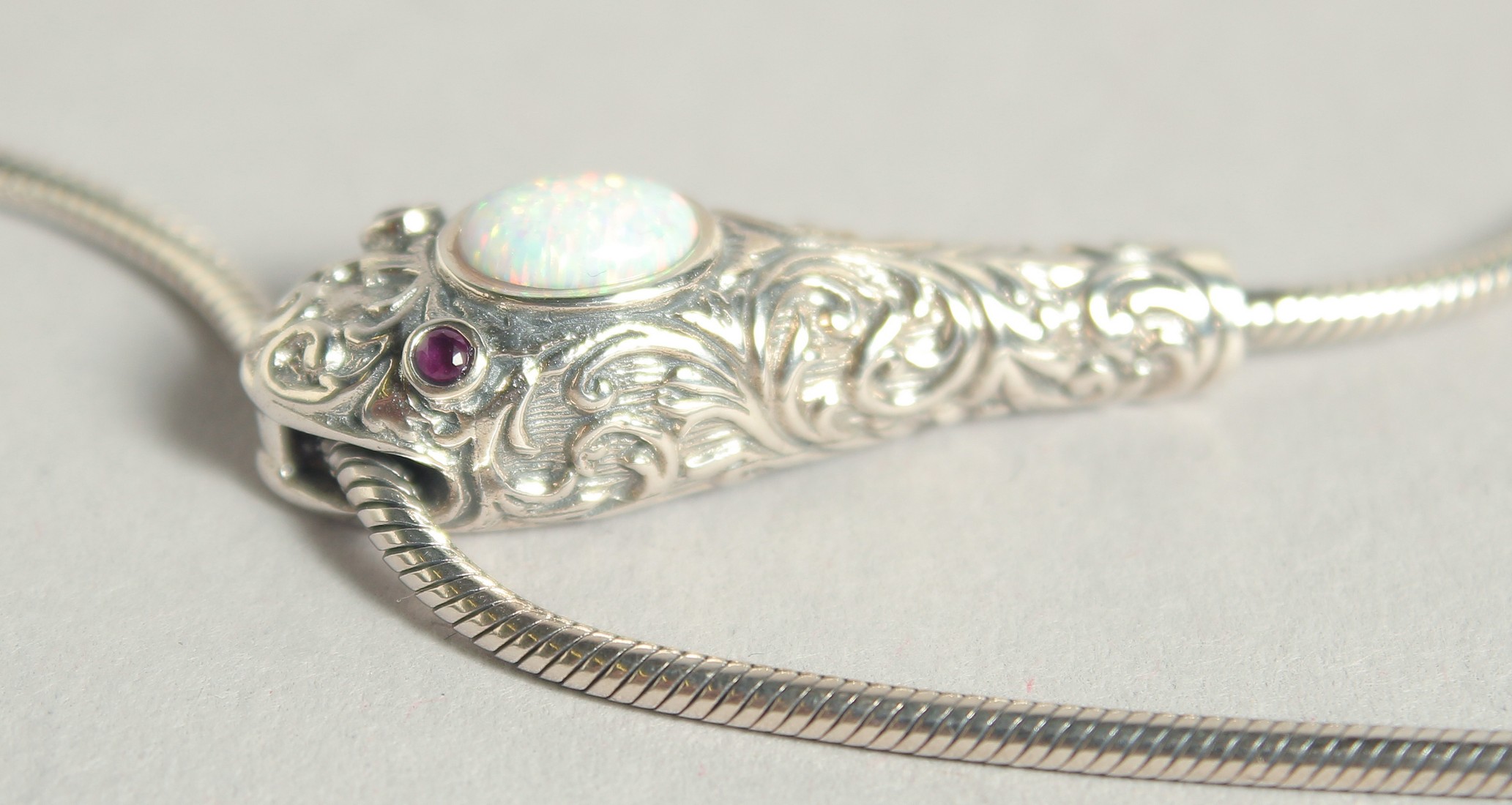 A SILVER OPAL AND RUBY EYE SNAKE BRACELET. - Image 2 of 3