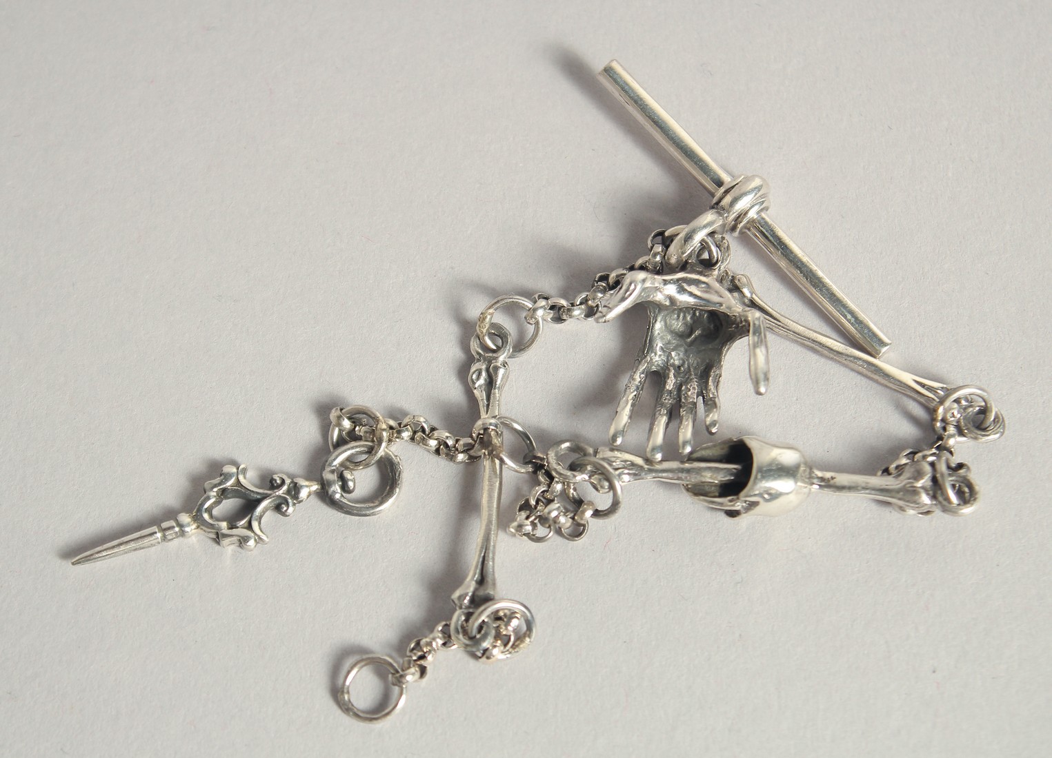 A SILVER SKULL WATCH CHAIN. - Image 2 of 2