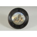 A PORCELAIN POT LID, HAULING THE TRAWL, 4ins diameter, framed.