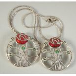 A SILVER AND ENAMEL CELTIC ROSE NECKLACE AND BROOCH.