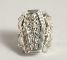 A SILVER COFFIN AND BAT SKELETON RING.