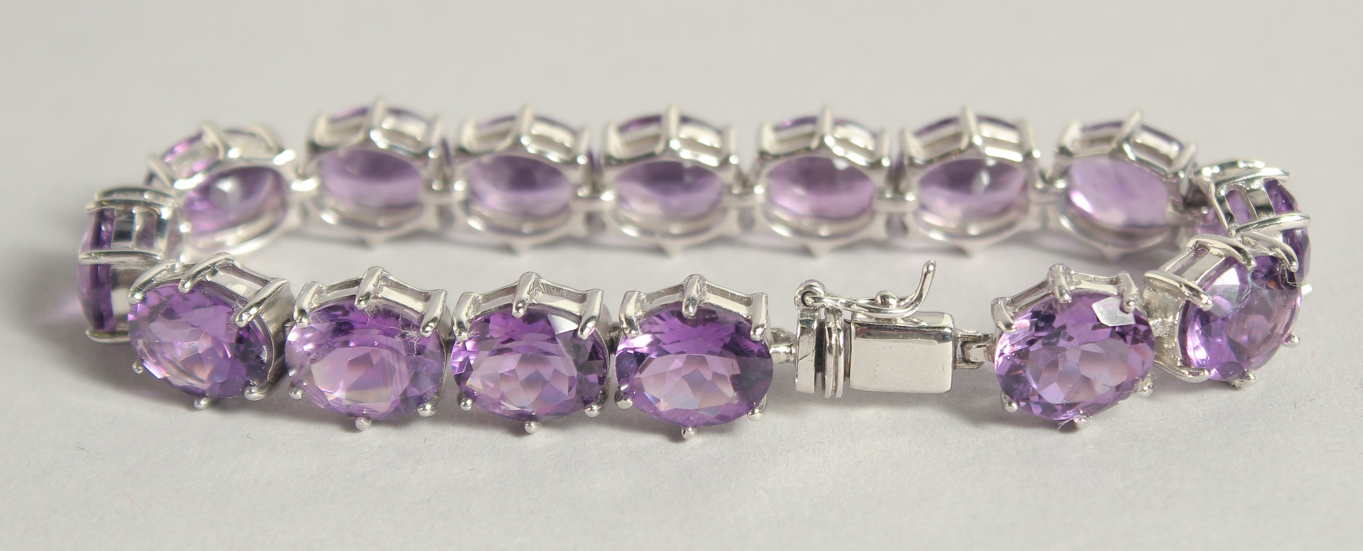 A SILVER BRACELET WITH FIFTEEN REAL AMETHYSTS. - Image 2 of 2