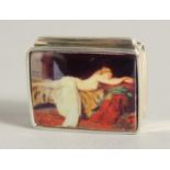 A SILVER AND ENAMEL NUDE PILL BOX, 1.25".