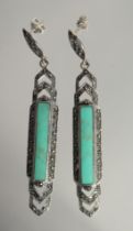 A PAIR OF SILVER TURQUOISE AND MARCASITE DROP LONG EARRINGS.