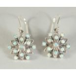 A PAIR OF SILVER CLUSTER OPAL EARRINGS.