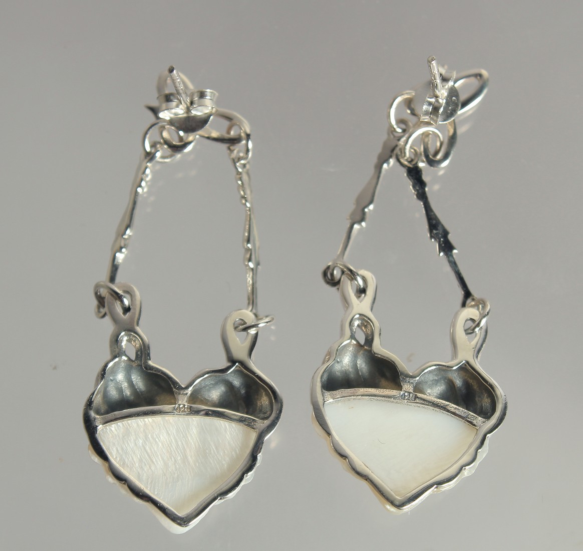 A PAIR OF SILVER ART DECO DESIGN CARVED FACE EARRINGS. - Image 2 of 2