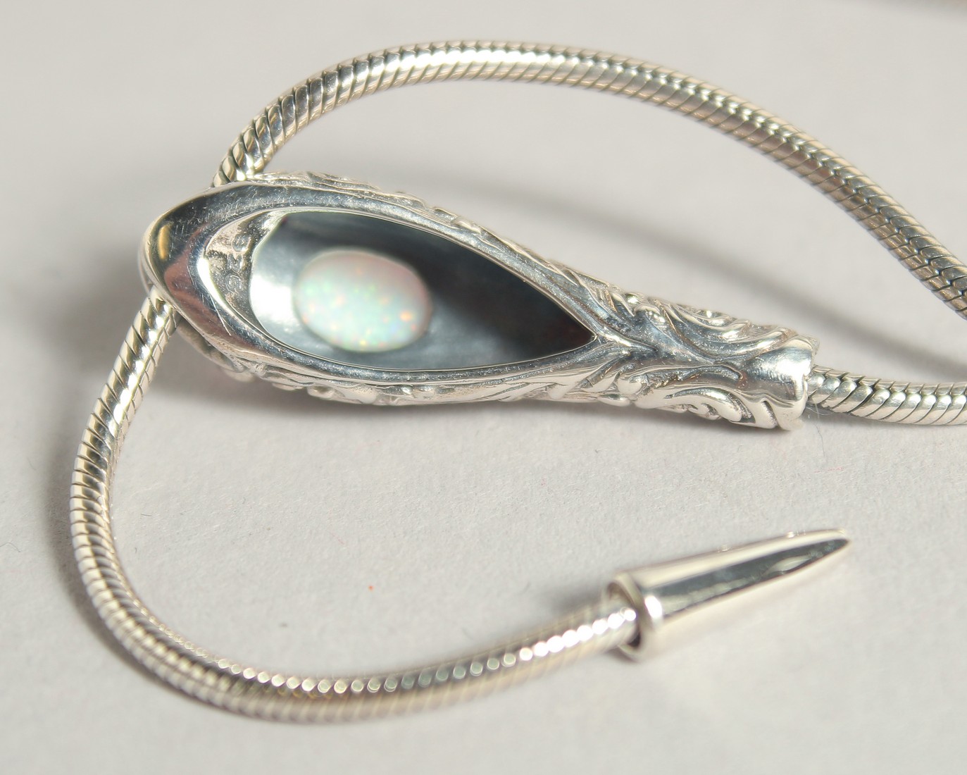 A SILVER OPAL AND RUBY EYE SNAKE BRACELET. - Image 3 of 3