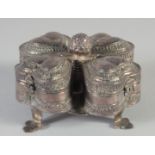 A 19TH CENTURY INDIAN SILVER SPICE BOX, with four compartments, 10cm wide.