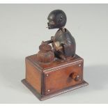 A JAPANESE CARVED WOOD ARTICULATED KOBE TOY, base 8cm x 6cm.