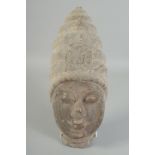 A CARVED STONE BUDDHA HEAD, 37cm x 15cm.