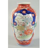 A JAPANESE IMARI PORCELAIN VASE, 24cm high.