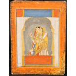 A 19TH CENTURY INDIAN MINIATURE PAINTING OF TWO LADIES, unframed, 32.5cm x 24cm.