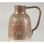 A SMALL EMBOSSED AND CHASED COPPER JUG, decorated with animals, 9.5cm high.
