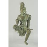 A LARGE SOUTH EAST ASIAN BRONZE BUDDHA, in perched position with one leg outstretched, 42cm high.