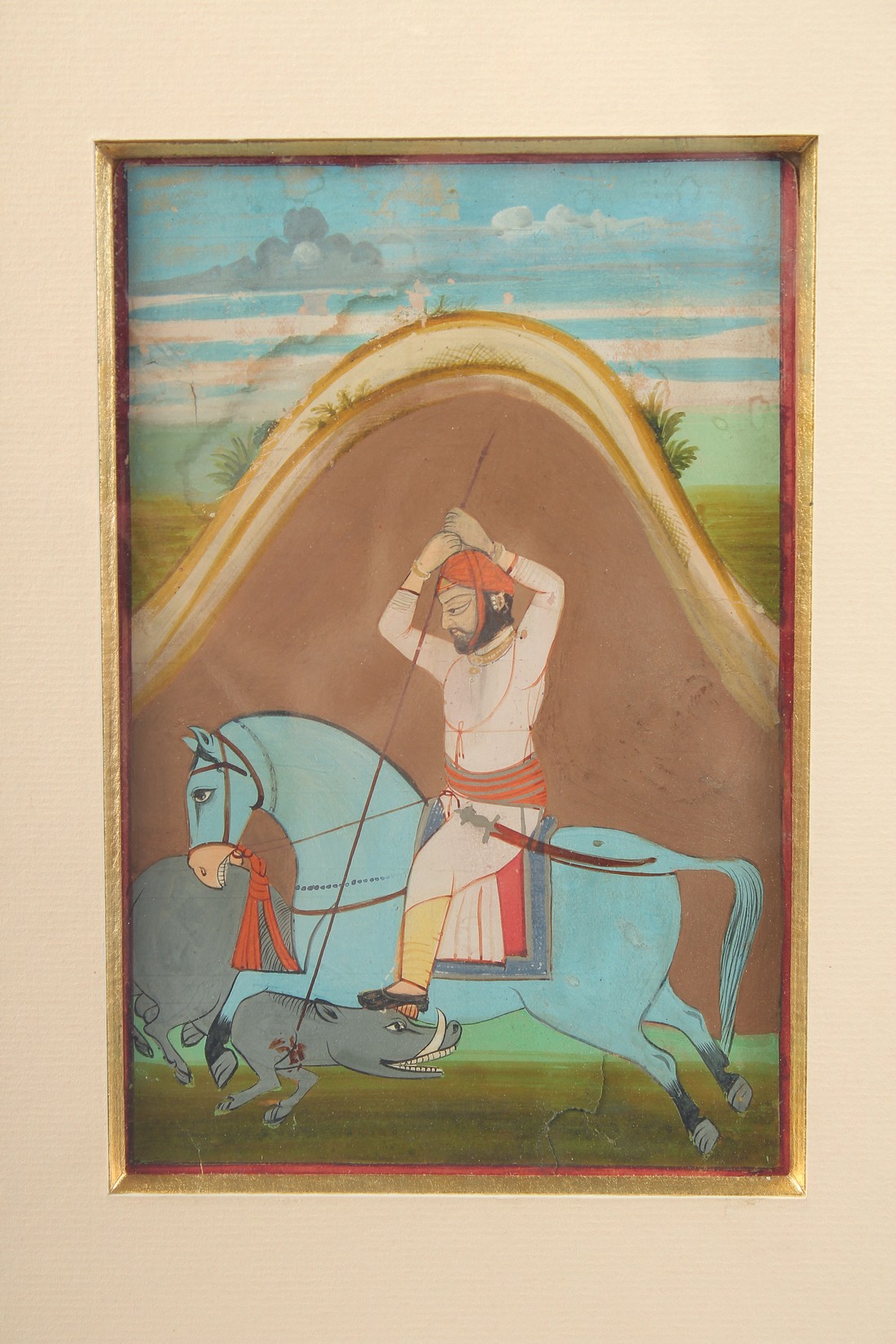 A 19TH CENTURY INDIAN MINIATURE PAINTING, depicting a horse and rider spear hunting a wild boar in - Image 2 of 3