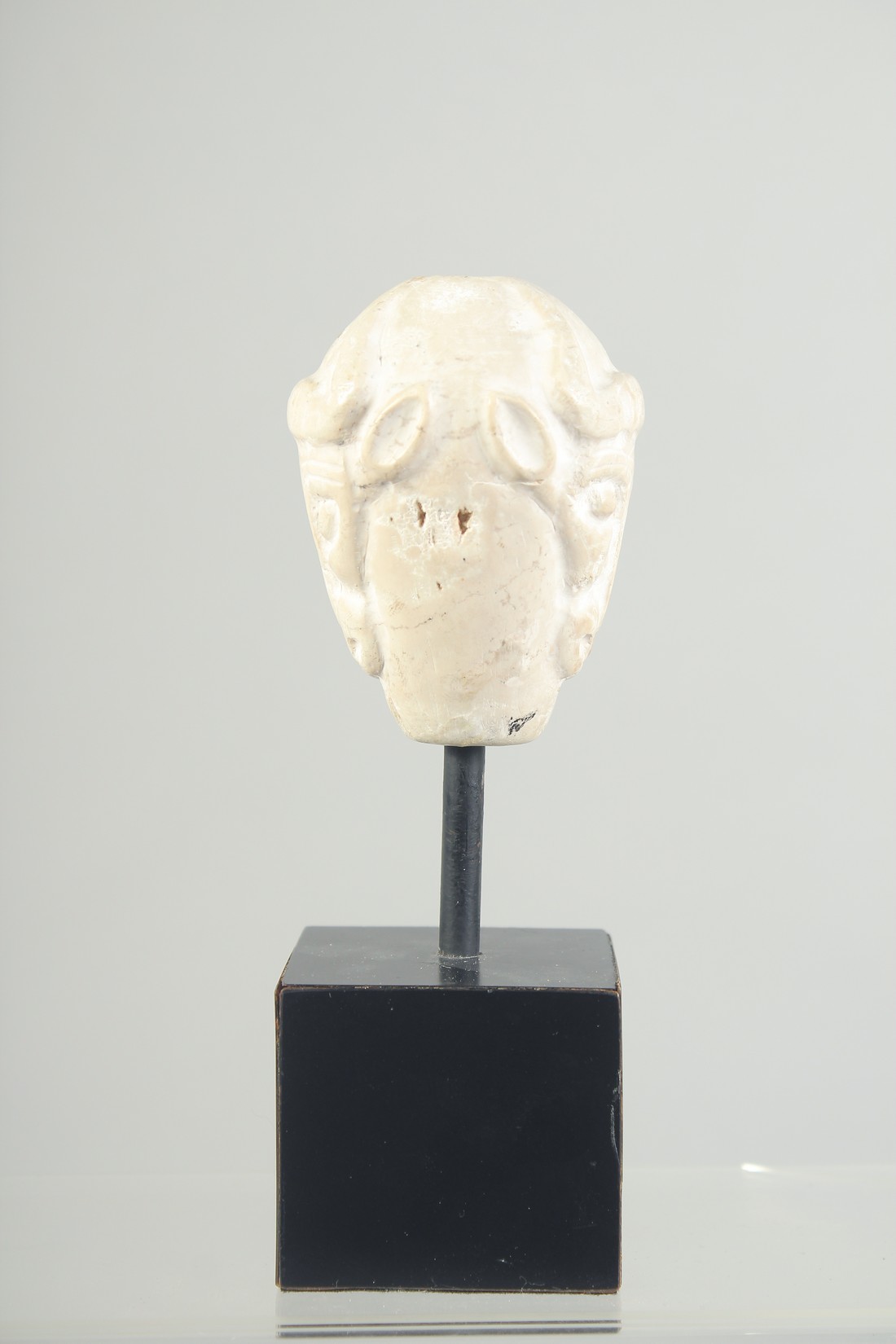 A RARE MESOPOTAMIA MASE HEAD with carved double-sided bull head, 4000 bc, raised on a purpose-made - Image 2 of 5