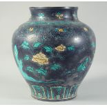 A LARGE CHINESE FAHUA-TYPE PORCELAIN JAR, painted with flowers and lucky symbols, 34cm high.