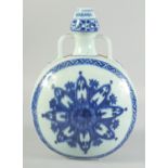 A CHINESE BLUE AND WHITE PORCELAIN TWIN HANDLE MOON FLASK, 30.5cm high.