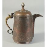 A PERSIAN SAFAVID INSCRIBED COPPER SPOUTED TANKARD, with engraved decoration, 28cm high.