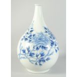 A LARGE 19TH CENTURY JAPANESE ARITA BLUE AND WHITE PORCELAIN VASE, painted with flowers, (base