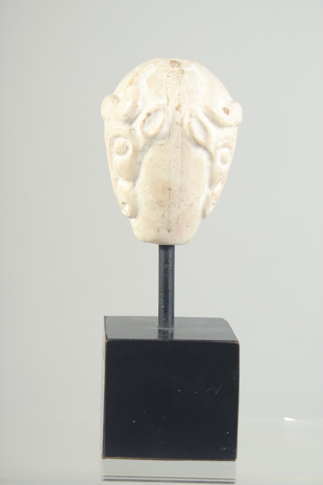 A RARE MESOPOTAMIA MASE HEAD with carved double-sided bull head, 4000 bc, raised on a purpose-made - Image 4 of 5