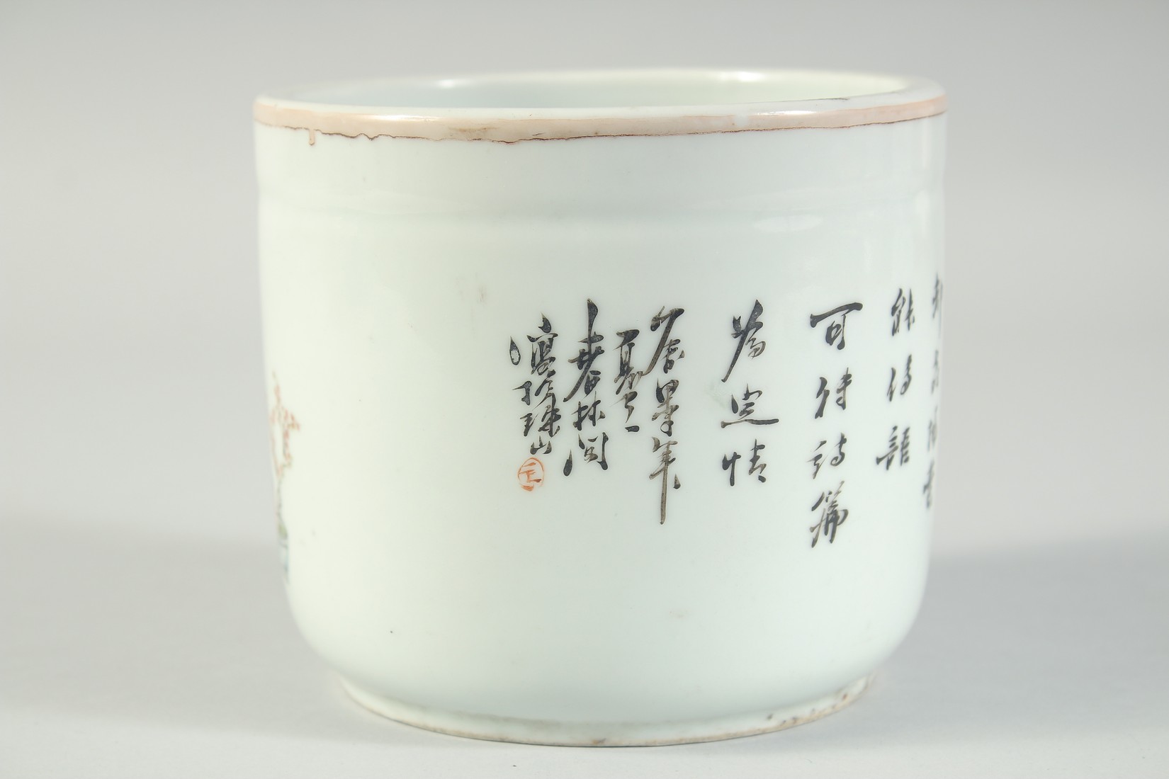 A CHINESE REPUBLIC PORCELAIN BRUSH POT, finely painted with figures in a garden and bearing four- - Image 2 of 5