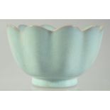 A CHINESE CELADON GLAZE PETAL-FORM BOWL, 16.5cm diameter.