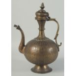 A FINE 19TH CENTURY ISLAMIC INDIAN ENGRAVED BRASS EWER, with hinged lid and floral decoration,