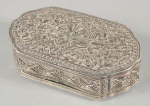A FINE 19TH CENTURY SRI LANKAN SILVER BOX, with embossed foliate decoration, weight 55g, 9cm x 5cm.